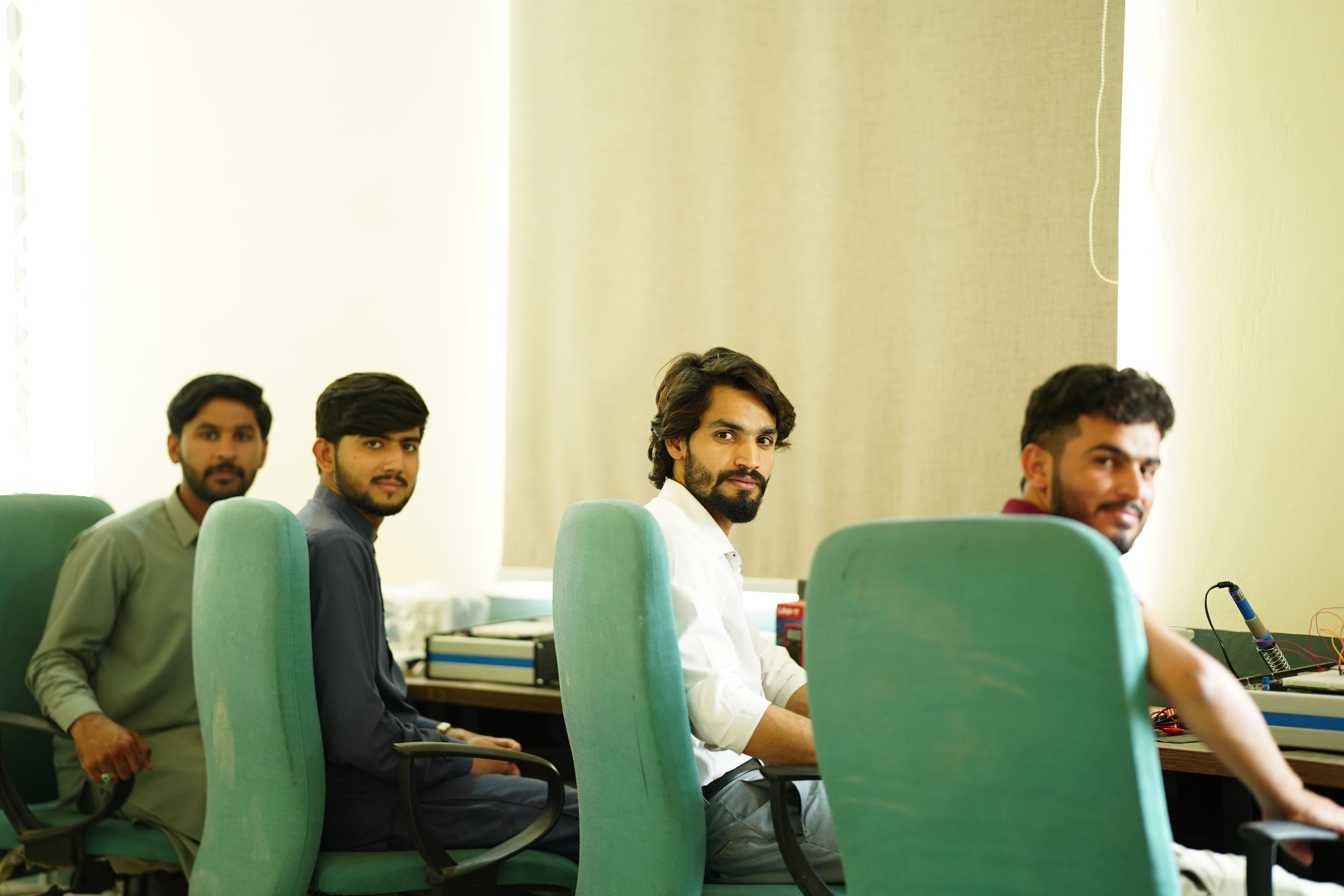 University of Layyah Computer Engineering Students collaborating in the lab